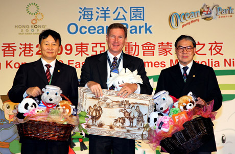 Photo 1: (From left) Dr Zagdsuren Demchigiav, Mr. Tom Mehrmann and the Hon. Timothy Fok, exchanged souvenirs on stage